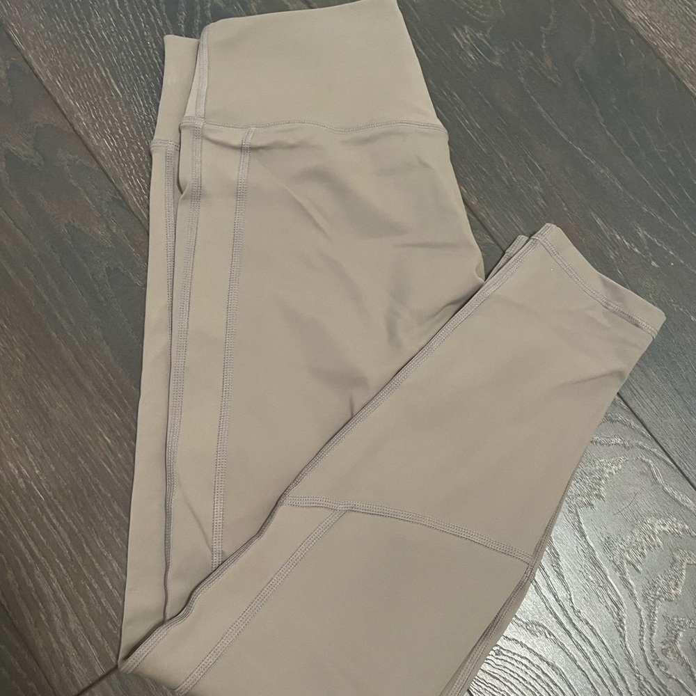 Grey Tilyoucollapse leggings. Size M